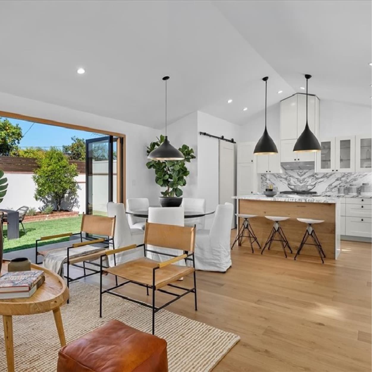 Bright open-plan home remodel with seamless indoor-outdoor connection in Hawthorne